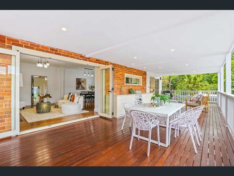 Australian home with covered deck and outdoor dining area